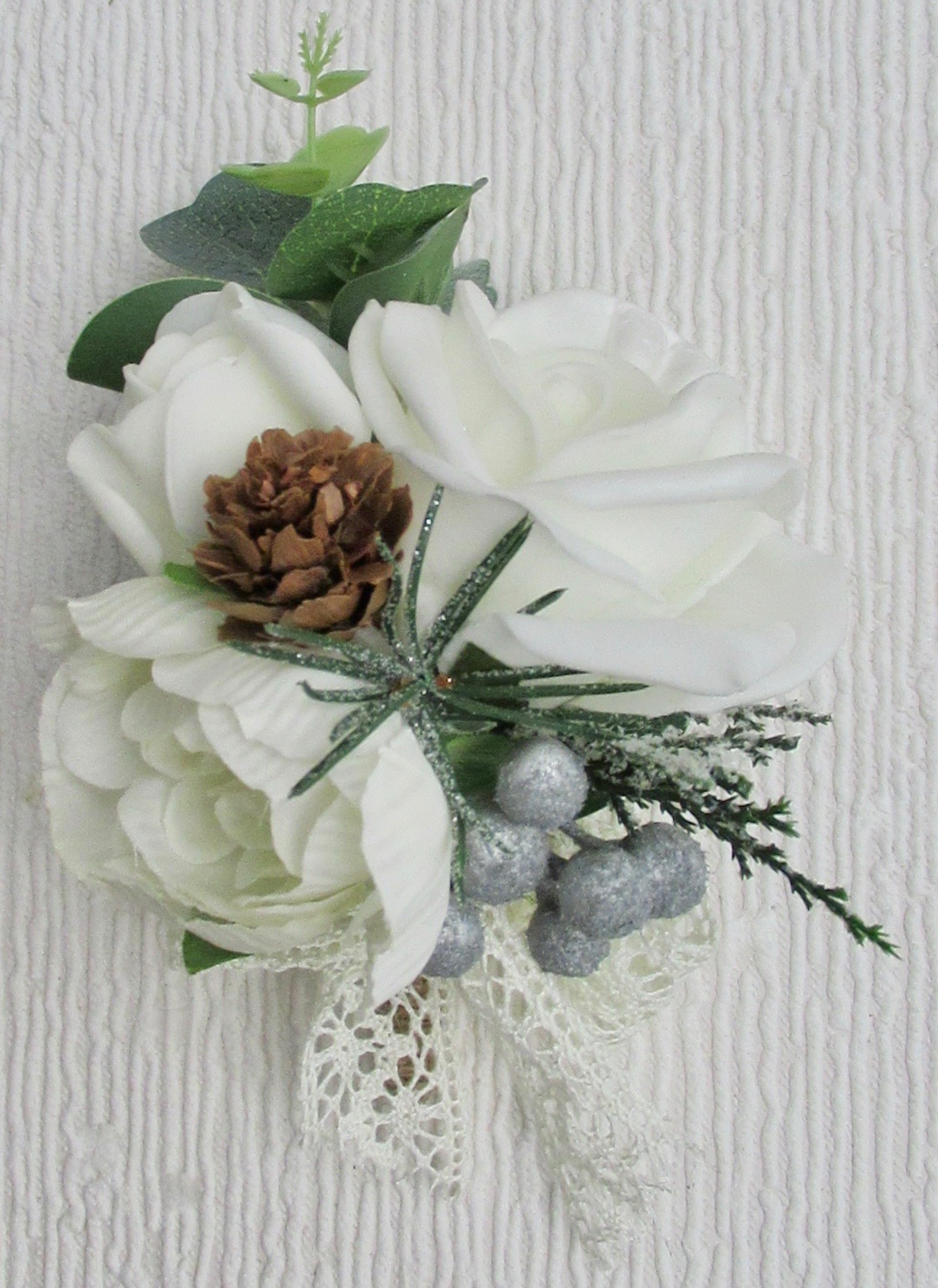 Corsage with Ivory Rose & Ranunculus with Mini Pine Cones
